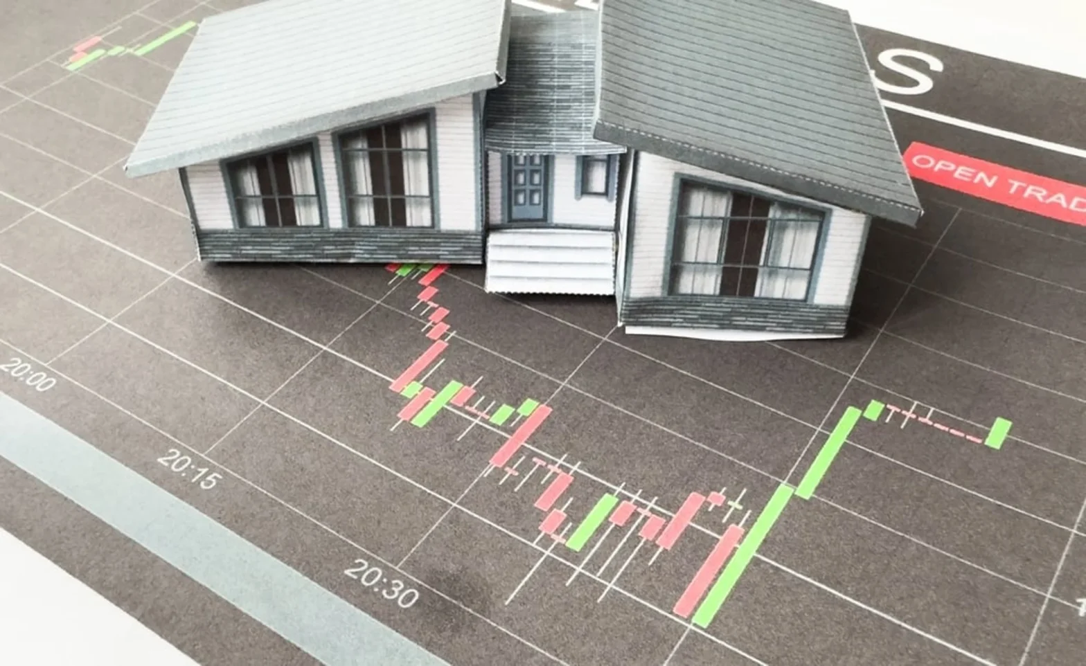 Miniature house models on graph indicati